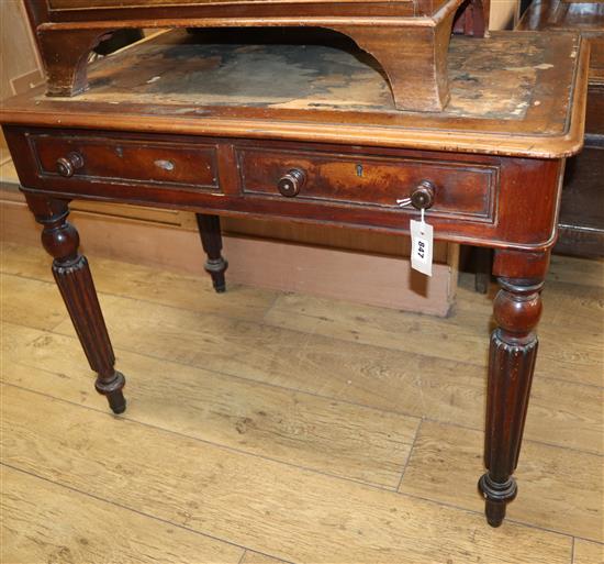 A Victorian mahogany two drawer writing table W.90cm